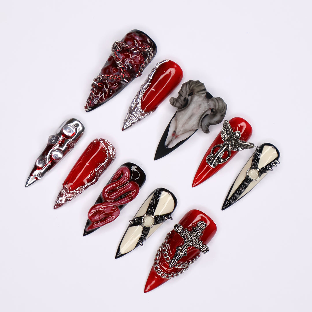 Red, black, and bone press on nails with gothic and horror-inspired 3D designs — handmade stiletto nails, custom press-ons, Halloween nail art, edgy fake nails — perfect for alt fashion, dark beauty looks, and statement nails.