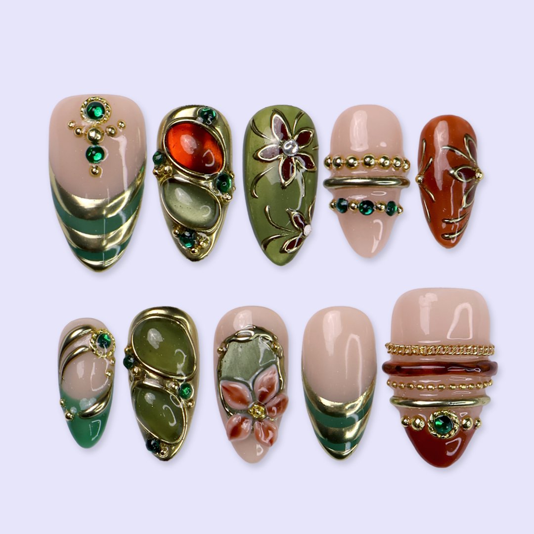 Chianti handmade fall press-on nails — fall almond set in nude, olive green and rust with amber and jade cabochons in ornate gold frames, 3D flowers, emerald gems and gold accents.