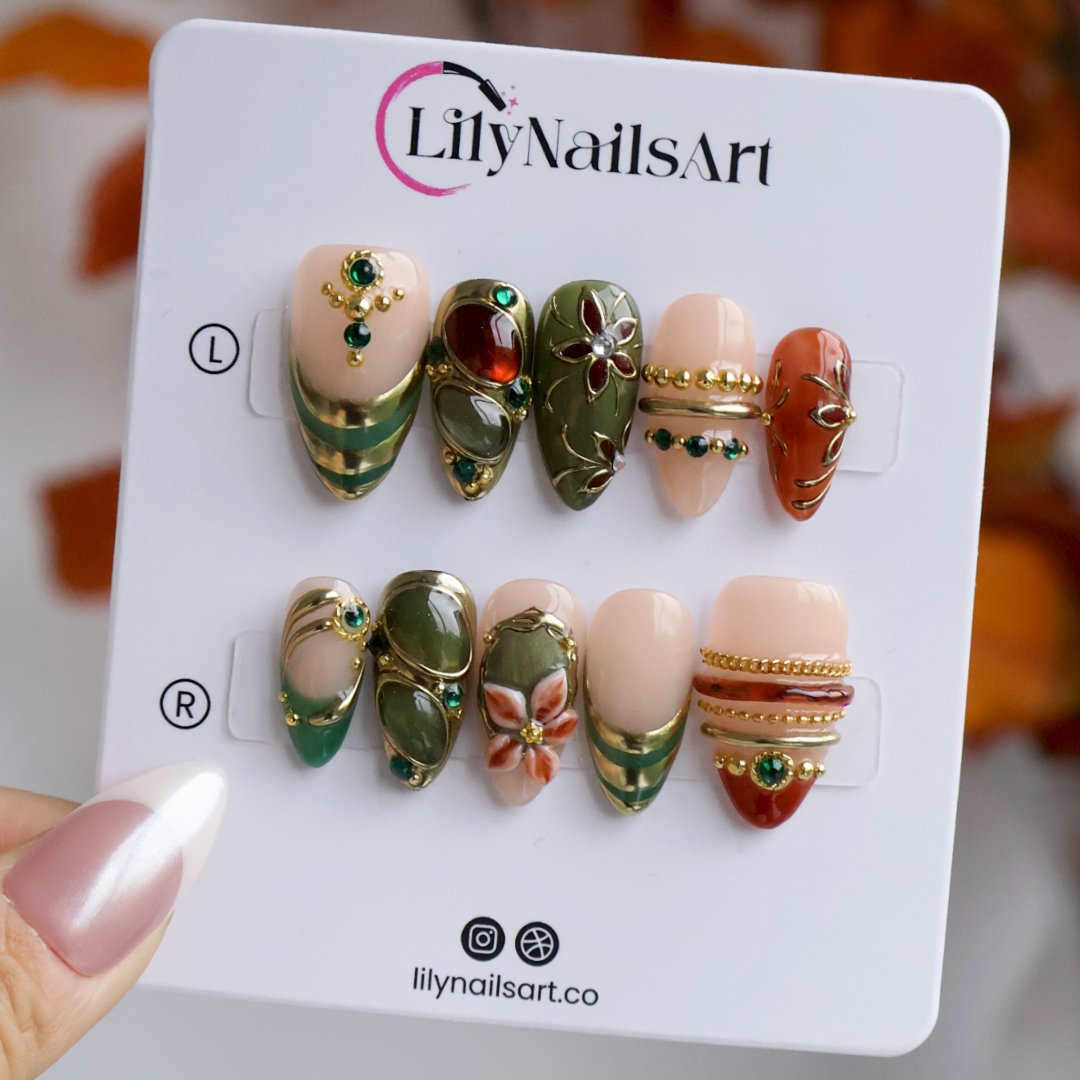 Chianti handmade fall press-on nails — fall almond set in nude, olive green and rust with amber and jade cabochons in ornate gold frames, 3D flowers, emerald gems and gold accents.