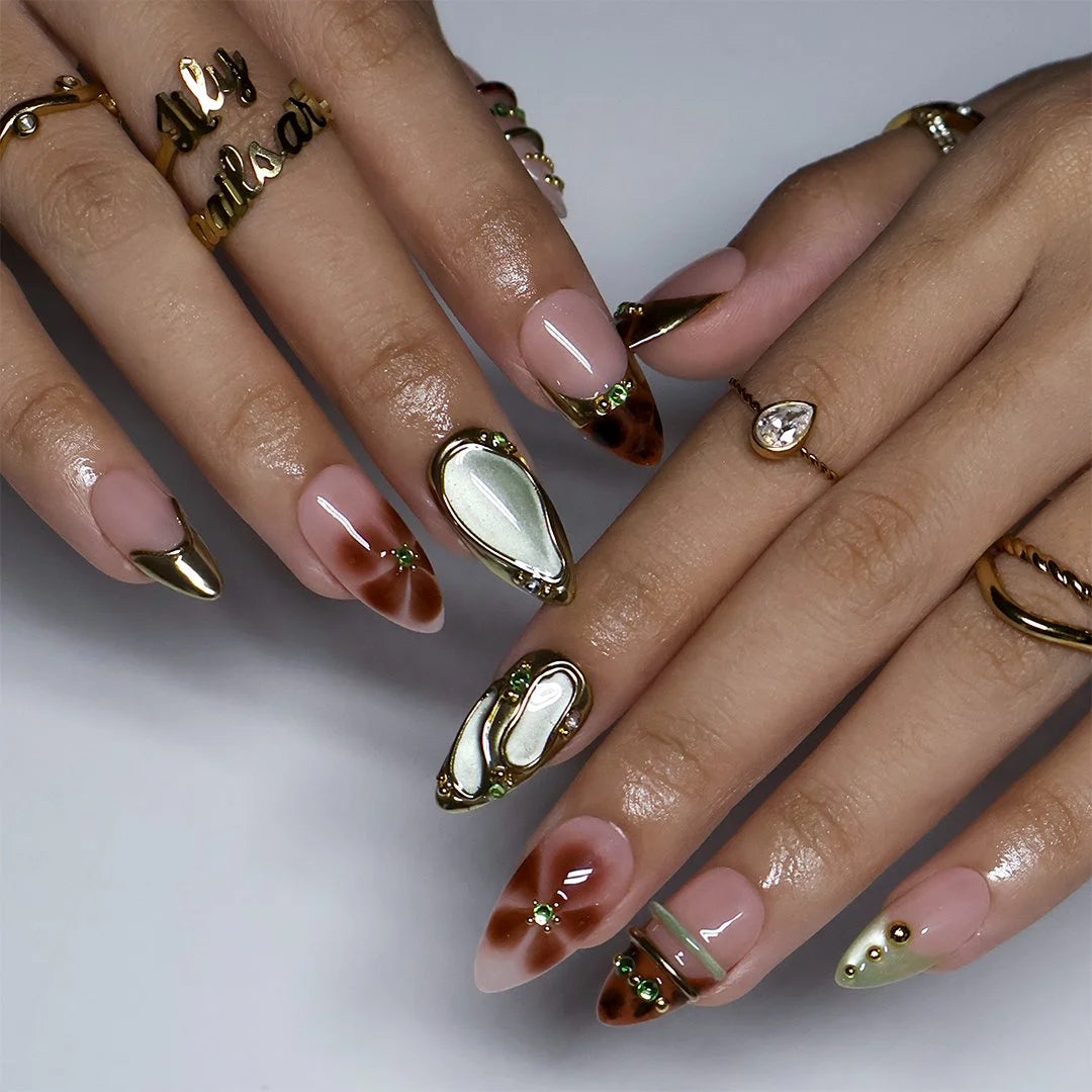 Olivra handmade fall press on nails in nude, tortoiseshell and sage green with gold French tips and cat-eye gems