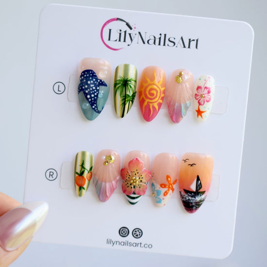Handmade summer press-on nails with tropical Florida-inspired art featuring palm trees, sunset sailboat, hibiscus and whale shark by Lily Nails Art
