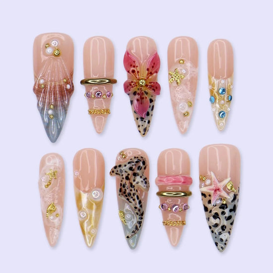 Handmade summer long almond press-on nails with leopard print, tropical flower, starfish and baby shark, perfect for nails holiday, vacation 