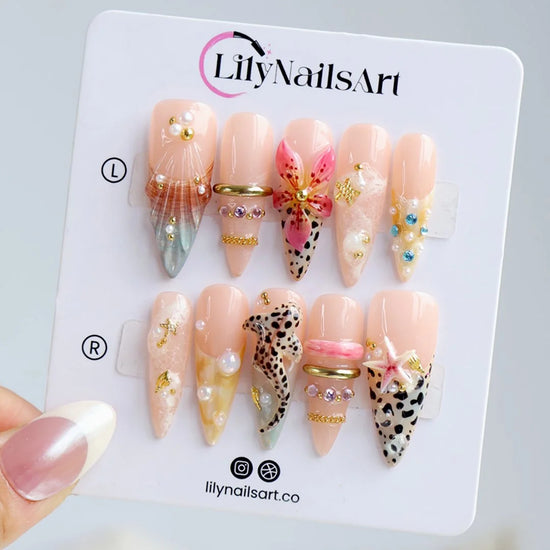 Handmade summer long almond press-on nails with leopard print, tropical flower, starfish and baby shark, perfect for nails holiday, vacation 