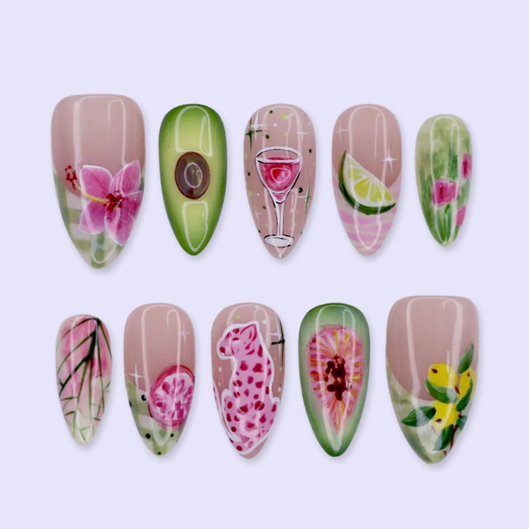 Handmade summer press-on nails with hand-painted avocado, wine glass, lime slice, pink leopard and tropical floral art by Lily Nails Art