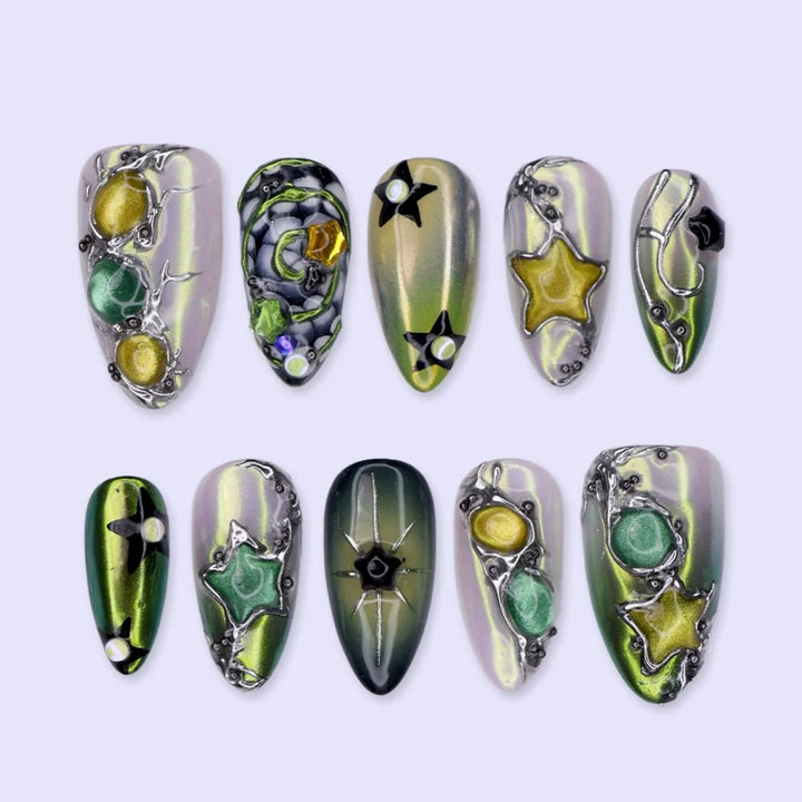 Supernova handmade Y2K press-on nails — almond set in olive-green and gold cat-eye with silver metal vines, stars and gems