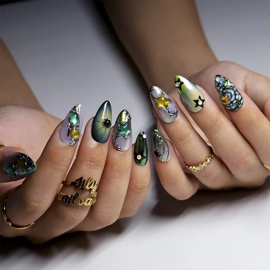 Supernova handmade Y2K press-on nails — almond set in olive-green and gold cat-eye with silver metal vines, stars and gems