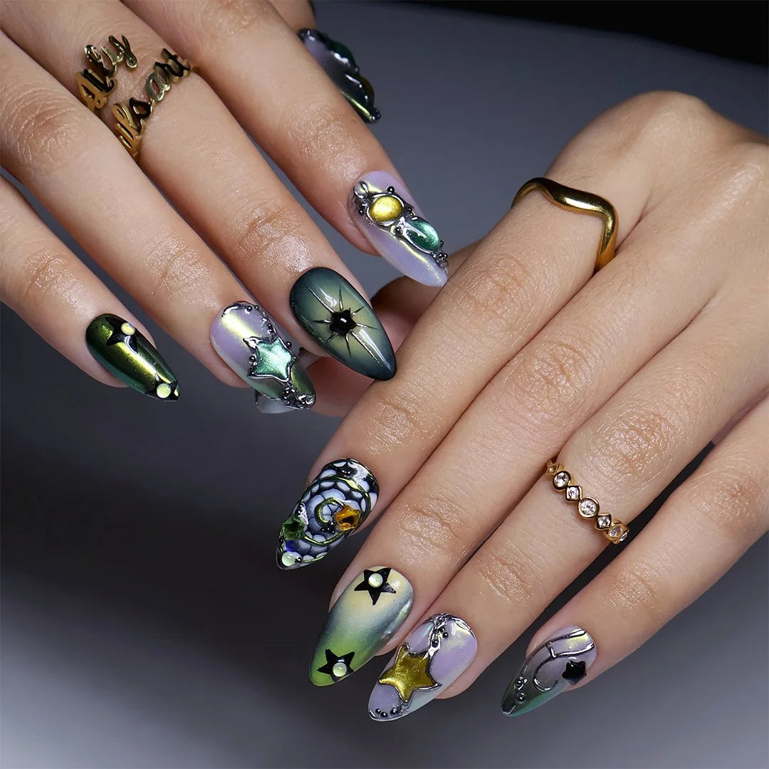 Close-up of cat-eye shimmer and jewel cabochon detail on almond nails