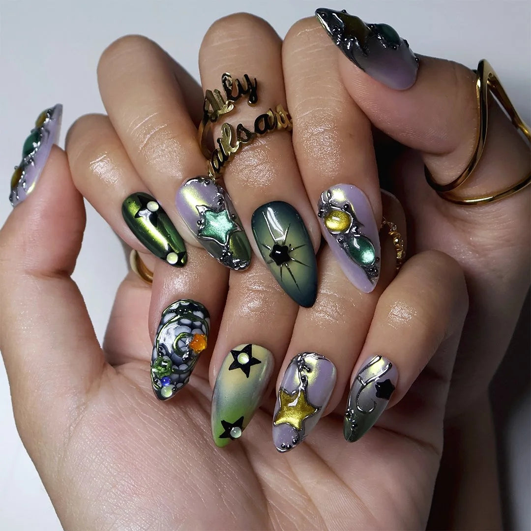 Green and chrome almond press on nails worn on hand