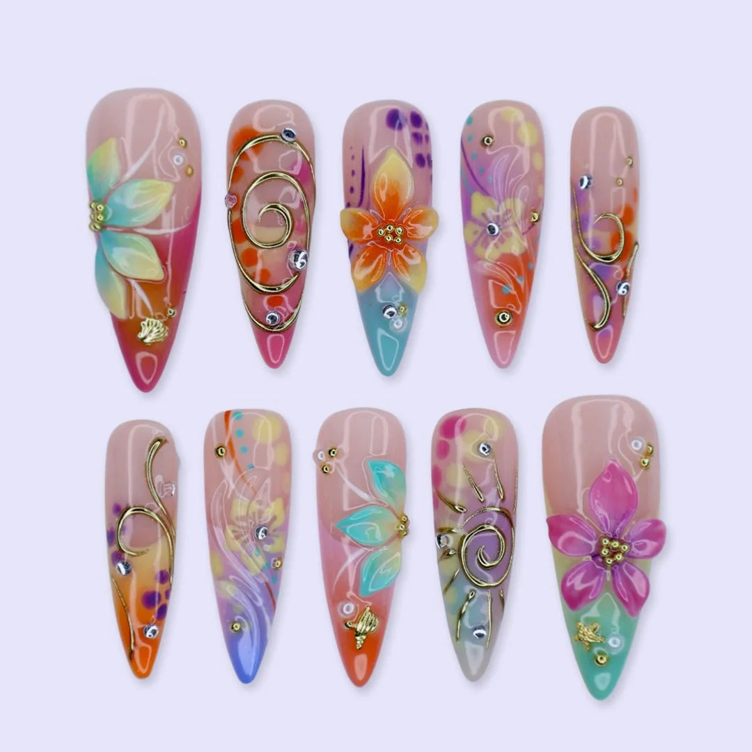 Handmade summer stiletto press-on nails with abundant multicolour florals, 3D blooms, gold spiral charms and crystal embellishments by Lily Nails Art
