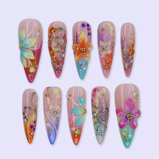 Handmade summer stiletto press-on nails with abundant multicolour florals, 3D blooms, gold spiral charms and crystal embellishments by Lily Nails Art
