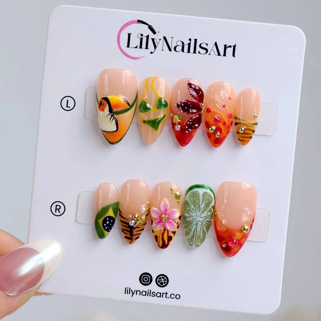 Handmade summer press-on nails with Brazil-inspired toucan, Brazilian flag, tiger stripes and tropical floral art by Lily Nails Art