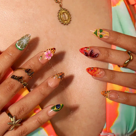 Handmade summer press-on nails with Brazil-inspired toucan, Brazilian flag, tiger stripes and tropical floral art by Lily Nails Art