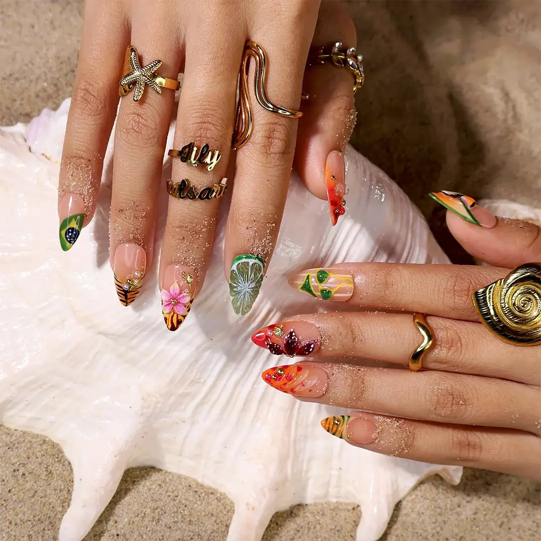 Handmade summer press-on nails with Brazil-inspired toucan, Brazilian flag, tiger stripes and tropical floral art by Lily Nails Art