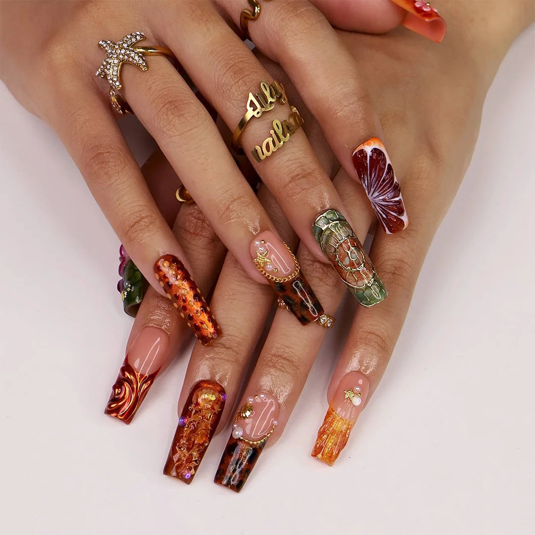 Amazonia handmade fall press-on nails — maximalist long square set in amber, tortoiseshell and gold