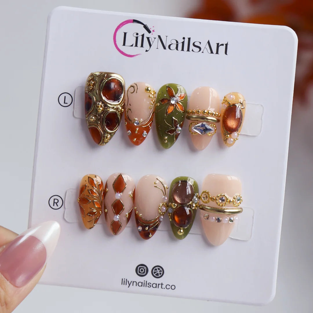 tertoise brown & green handmade fall press-on nails — maximalist medium almond set with amber gemstones, gold filigree and floral detail