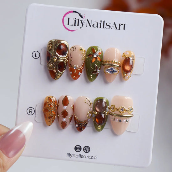tertoise brown & green handmade fall press-on nails — maximalist medium almond set with amber gemstones, gold filigree and floral detail