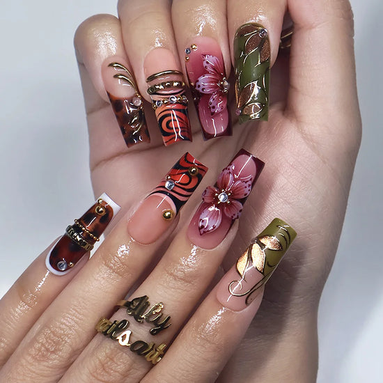 Harvest handmade press-on nails — maximalist long square set in nude, olive, rust and tortoiseshell with 3D pink lilies, gold leaves and gems
