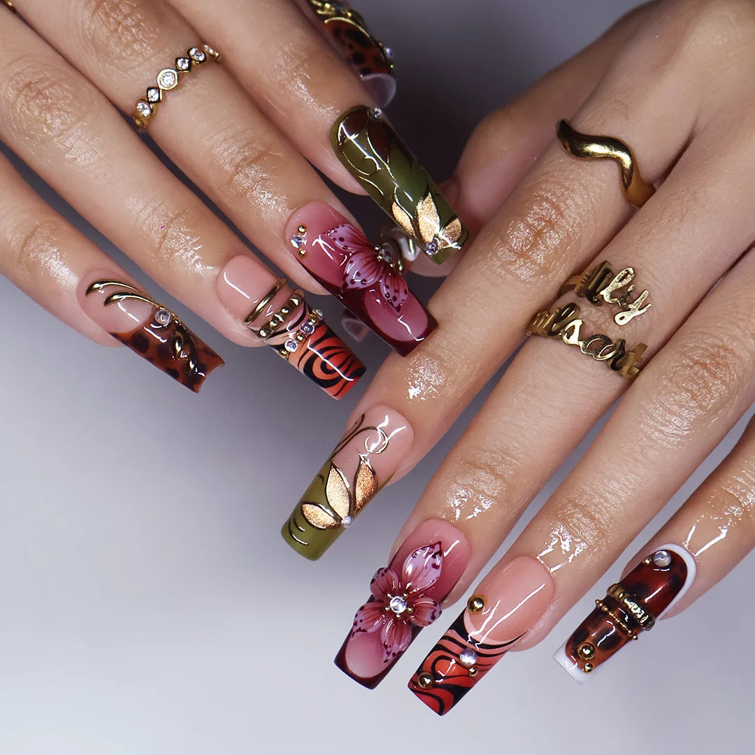 Harvest handmade press-on nails — maximalist long square set in nude, olive, rust and tortoiseshell with 3D pink lilies, gold leaves and gems
