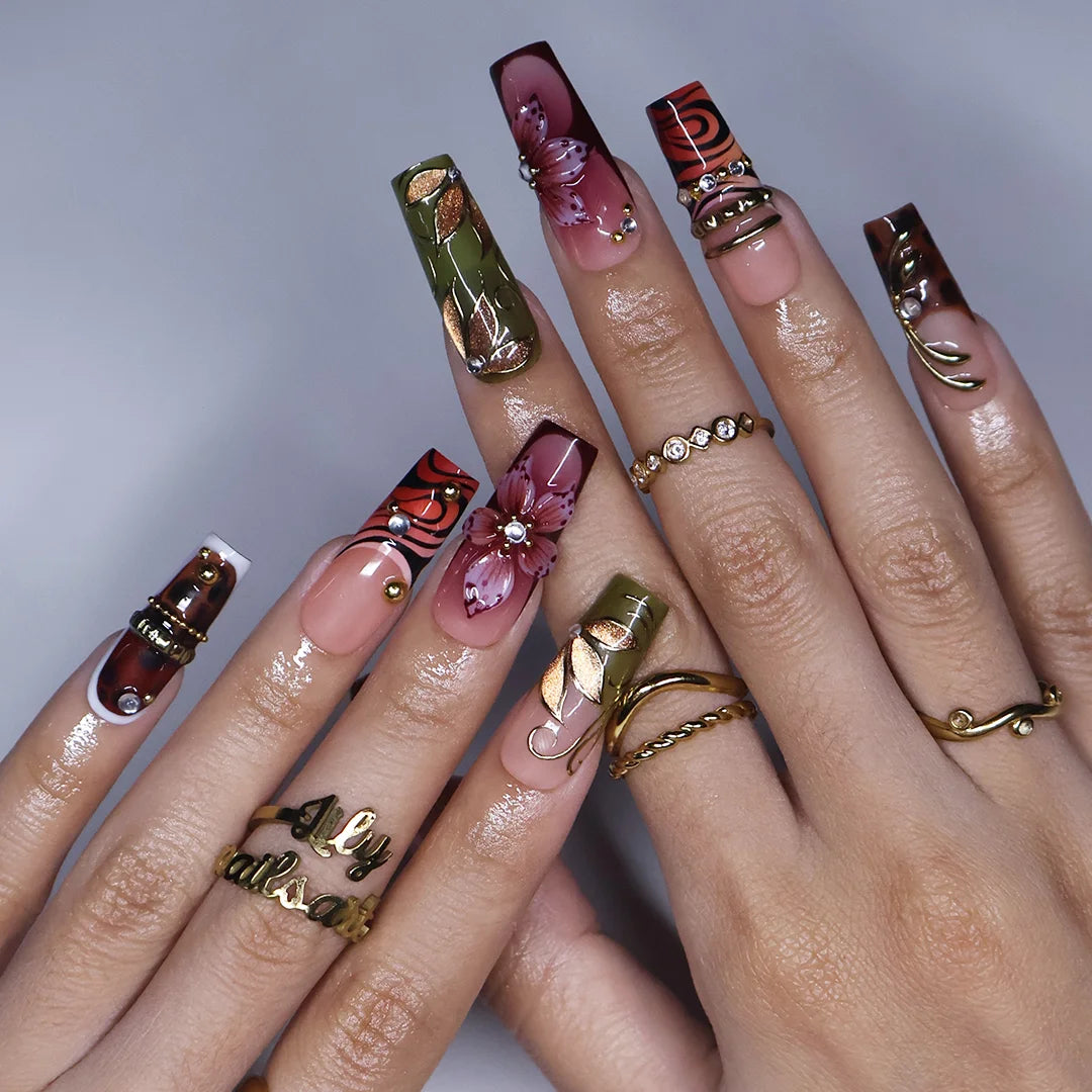 Harvest handmade press-on nails — maximalist long square set in nude, olive, rust and tortoiseshell with 3D pink lilies, gold leaves and gems
