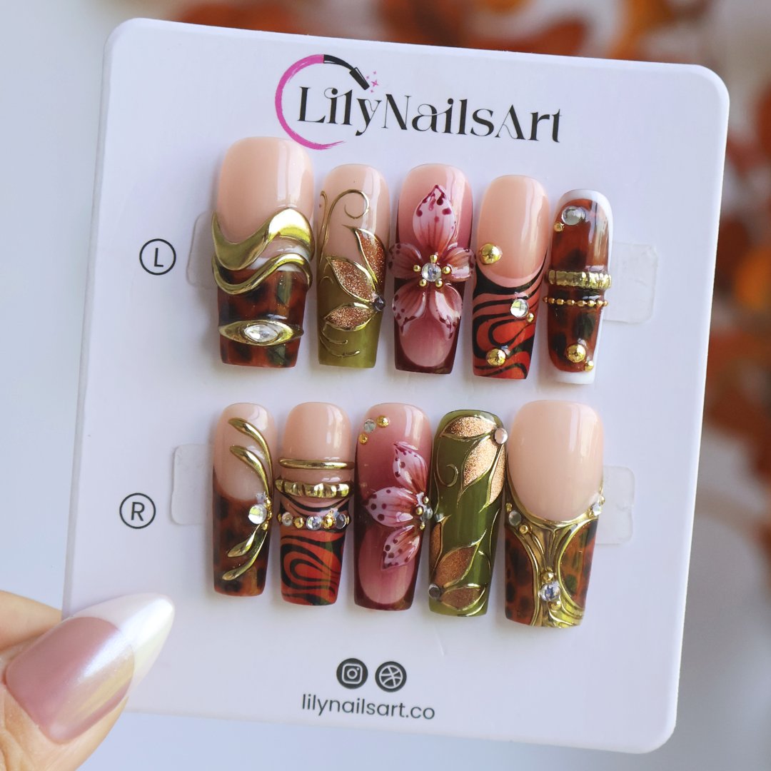 Harvest handmade press-on nails — maximalist long square set in nude, olive, rust and tortoiseshell with 3D pink lilies, gold leaves and gems
