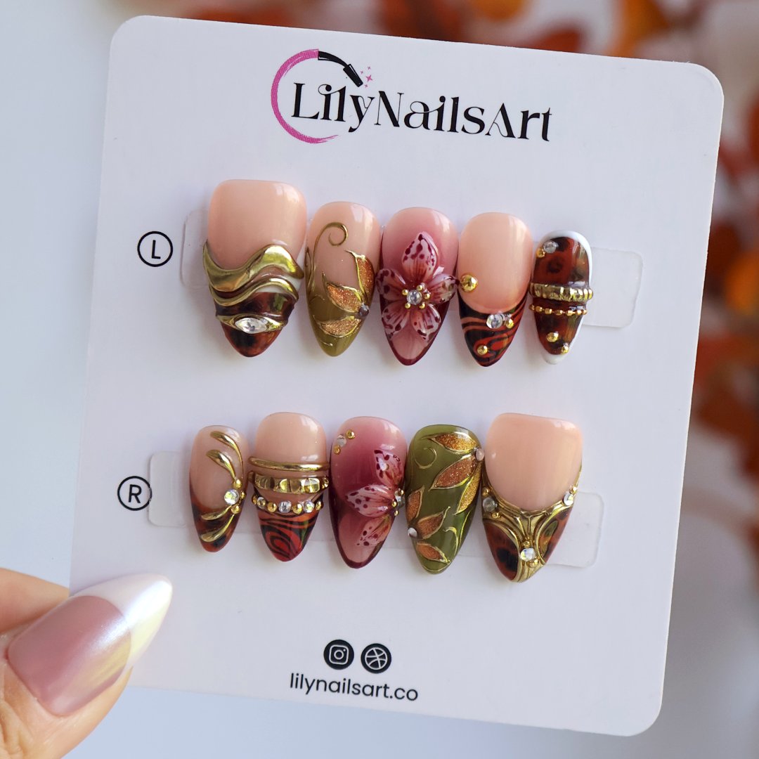 Harvest handmade press-on nails — maximalist medium almond set in nude, olive, rust and tortoiseshell with 3D pink lilies, gold leaves and gems
