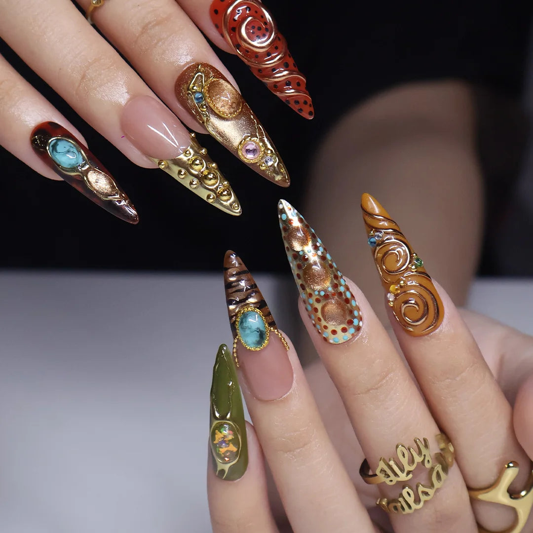 Bijou handmade maximalist press-on nails — long almond set in nude, caramel and olive with jade and turquoise cabochons in gold frames, spirals and beadwork
