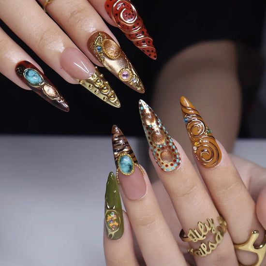 Bijou handmade maximalist press-on nails — long almond set in nude, caramel and olive with jade and turquoise cabochons in gold frames, spirals and beadwork
