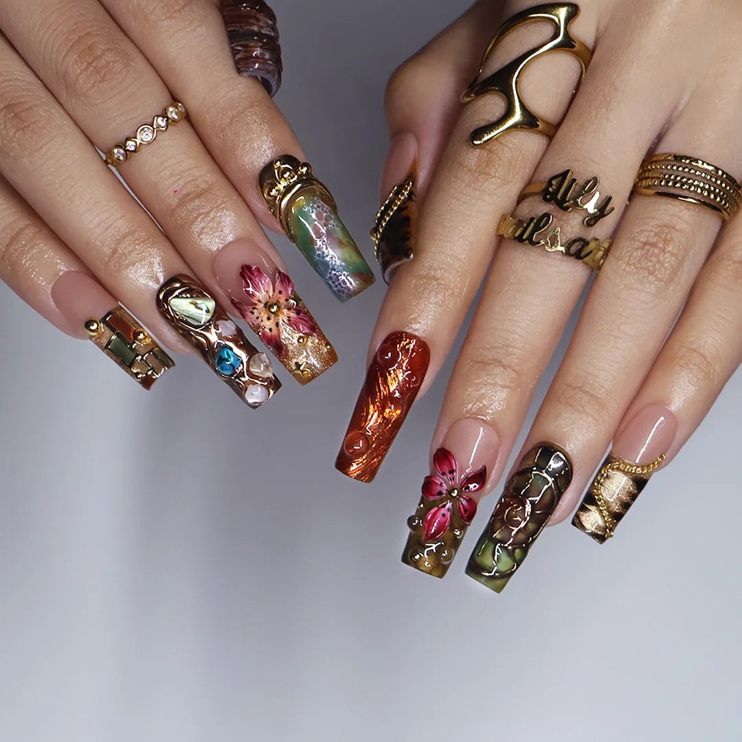 Oasis handmade maximalist press-on nails — long square set in nude, olive and copper with abalone shell, turquoise cabochons, 3D lilies and gold chains