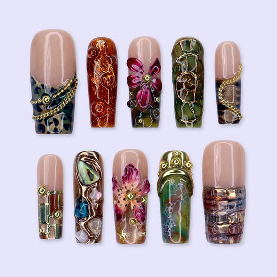 Oasis handmade maximalist press-on nails — long square set in nude, olive and copper with abalone shell, turquoise cabochons, 3D lilies and gold chains