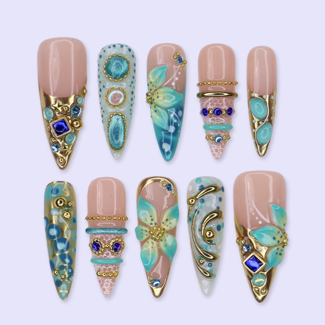 Handmade summer press-on nails — maximalist long almond set  in tiffany blue with sapphire gems, gold filigree and aqua 3D lilies
