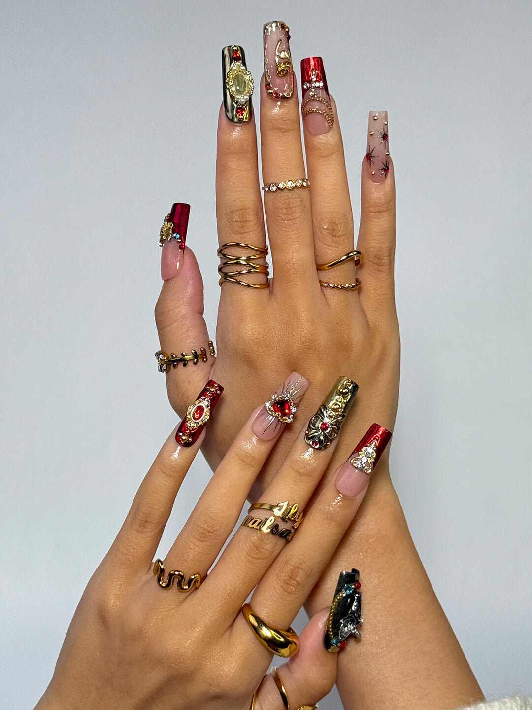Renaissance-inspired red and gold press on nails with 3D baroque charms, gothic gemstone accents, and ornate metallic detailing — handmade luxury press ons, reusable nail art, false nails, fake nails — perfect for holiday parties, Christmas glam, or editorial photoshoots.