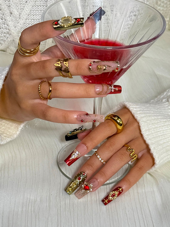 Renaissance-inspired red and gold press on nails with 3D baroque charms, gothic gemstone accents, and ornate metallic detailing — handmade luxury press ons, reusable nail art, false nails, fake nails — perfect for holiday parties, Christmas glam, or editorial photoshoots.