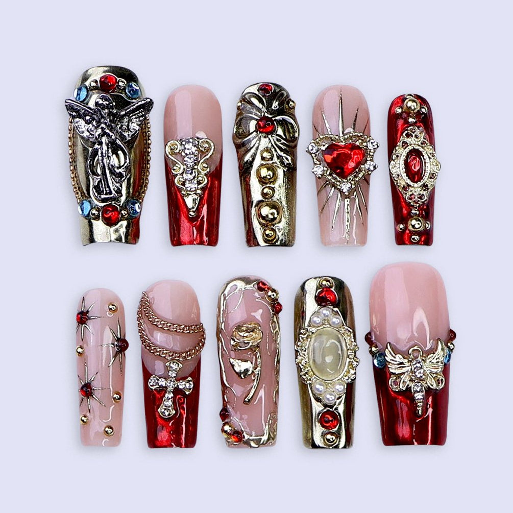Renaissance-inspired red and gold press on nails with 3D baroque charms, gothic gemstone accents, and ornate metallic detailing — handmade luxury press ons, reusable nail art, false nails, fake nails — perfect for holiday parties, Christmas glam, or editorial photoshoots.