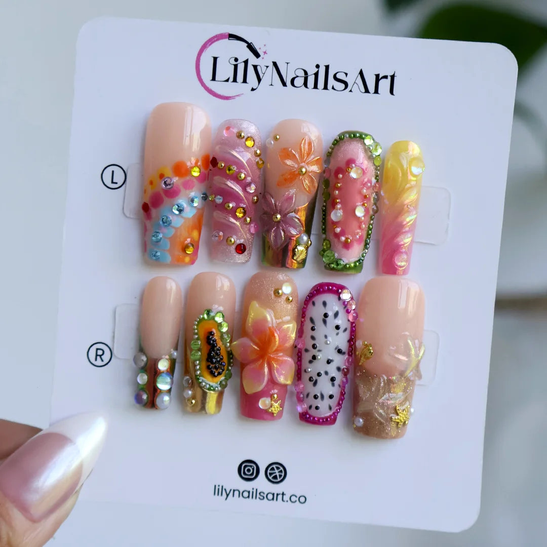 Sangria handmade summer press-on nails — maximalist long square set with tropical fruit designs, 3D flowers, chrome and rainbow gems
