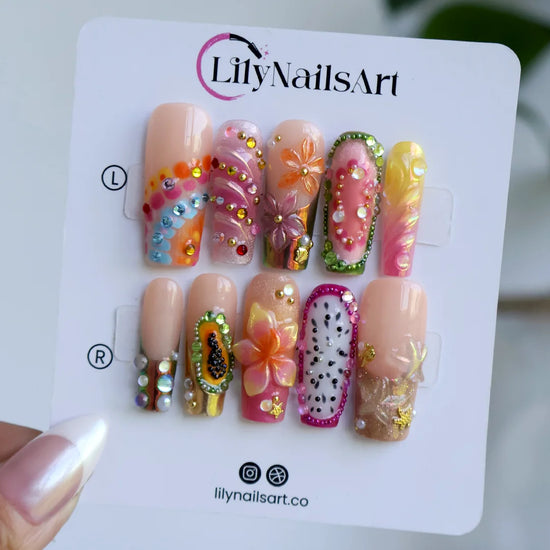 Sangria handmade summer press-on nails — maximalist long square set with tropical fruit designs, 3D flowers, chrome and rainbow gems
