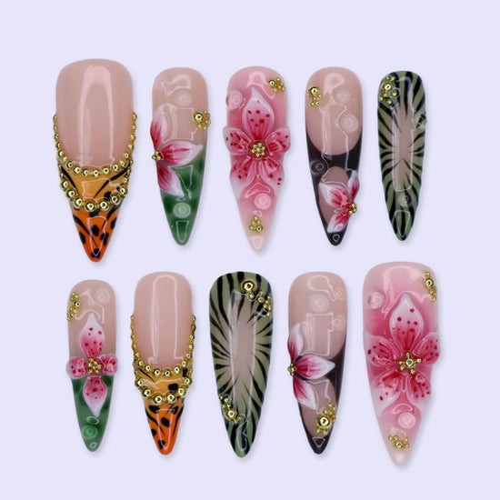 Green & pink handmade summer press-on nails — maximalist long almond set with tiger and zebra print, 3D pink lilies and gold beading
