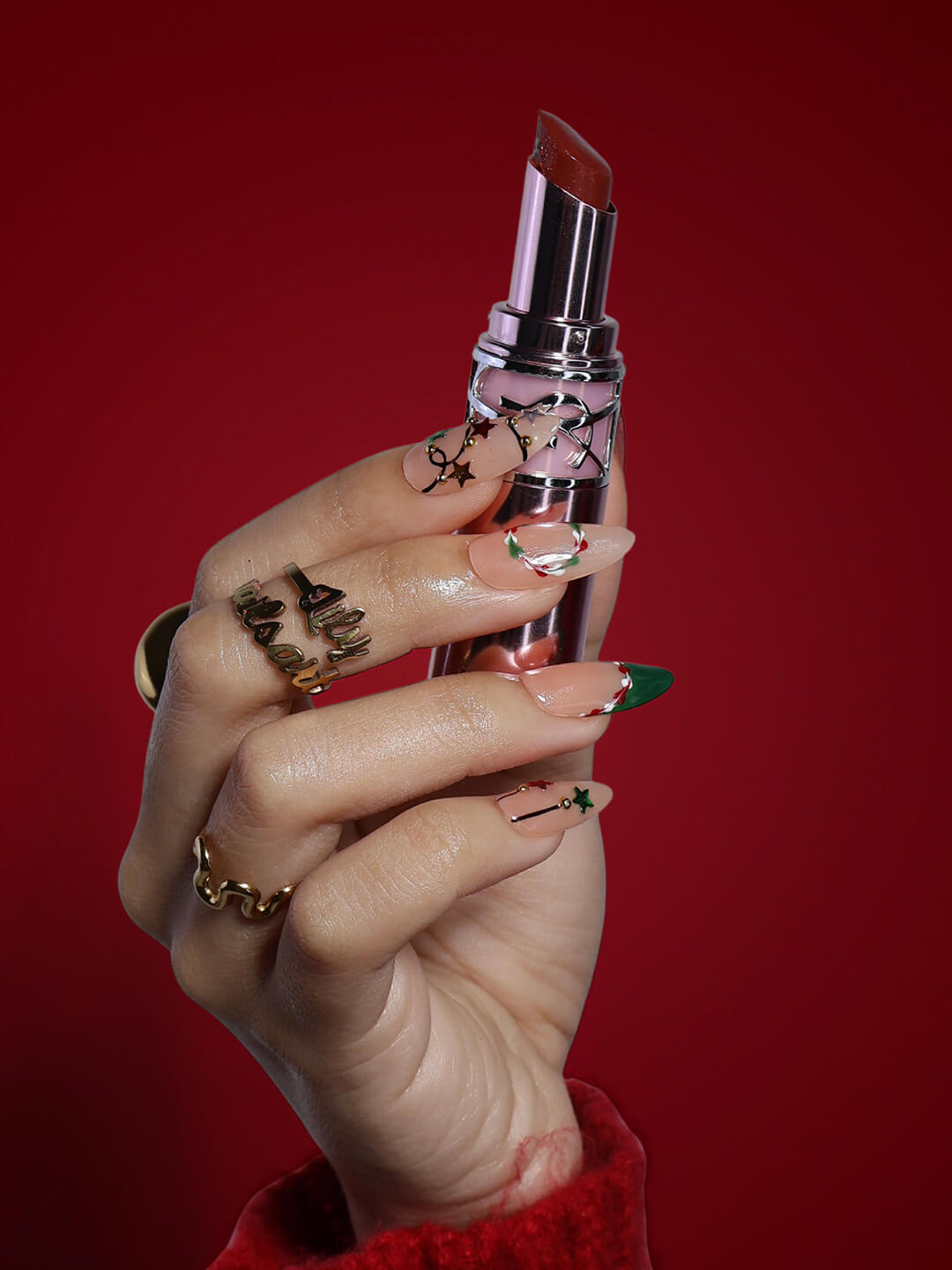 3D Christmas press on nails with red and green French tips, embellished with star garlands, metallic charms, and hand-painted snowflakes — festive holiday fake nails, reusable false nails, handmade nail art, custom pressons for winter, party or gift ideas