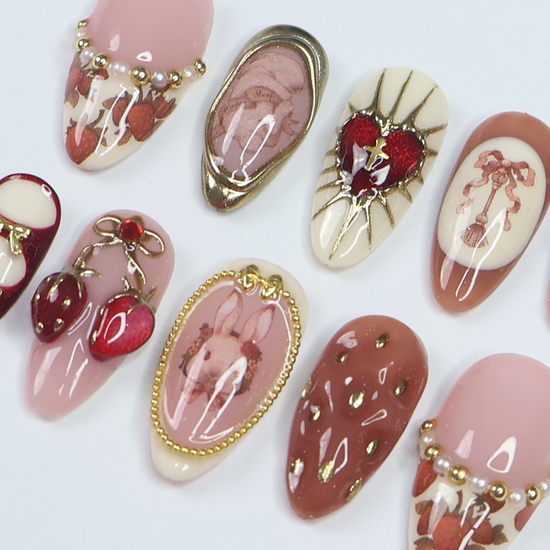 3D cute strawberry and bunny press on nails with pearl accents, heart charms, metallic gold bows, and vintage art details — luxury handmade press on nails, premium custom nail art, cute Japanese nail design, false nails, fake nails, pressons — perfect for birthdays, gifts, cosplay, or kawaii fashion lovers.
