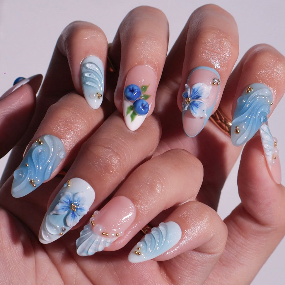 3D ocean blue press on nails with blueberries, sculpted flowers, and seashell accents — featuring glossy wave textures, pearl embellishments, and soft gradient blues — summer vacation nails, coastal press on nails, custom handmade nail art, fake nails, false nails, pressons — perfect for beach holidays, ocean-inspired looks, or gifting for her.
