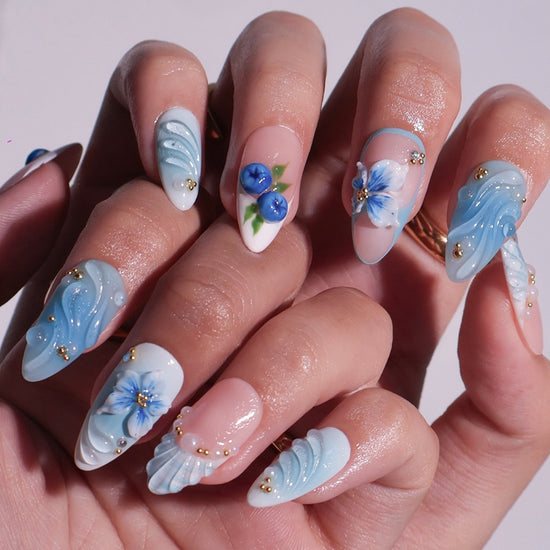 3D ocean blue press on nails with blueberries, sculpted flowers, and seashell accents — featuring glossy wave textures, pearl embellishments, and soft gradient blues — summer vacation nails, coastal press on nails, custom handmade nail art, fake nails, false nails, pressons — perfect for beach holidays, ocean-inspired looks, or gifting for her.
