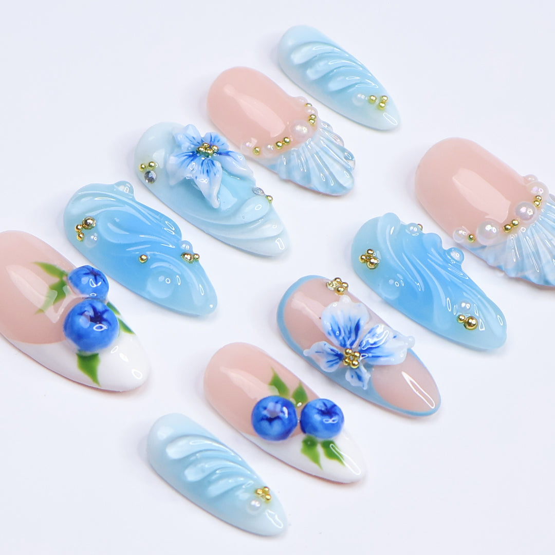 3D ocean blue press on nails with blueberries, sculpted flowers, and seashell accents — featuring glossy wave textures, pearl embellishments, and soft gradient blues — summer vacation nails, coastal press on nails, custom handmade nail art, fake nails, false nails, pressons — perfect for beach holidays, ocean-inspired looks, or gifting for her.