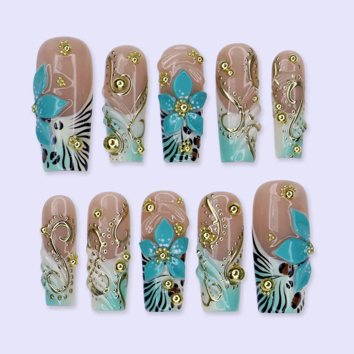Vermentino handmade press-on nails — maximalist long square set in Tiffany blue with 3D turquoise lilies, gold swirls and leopard print
