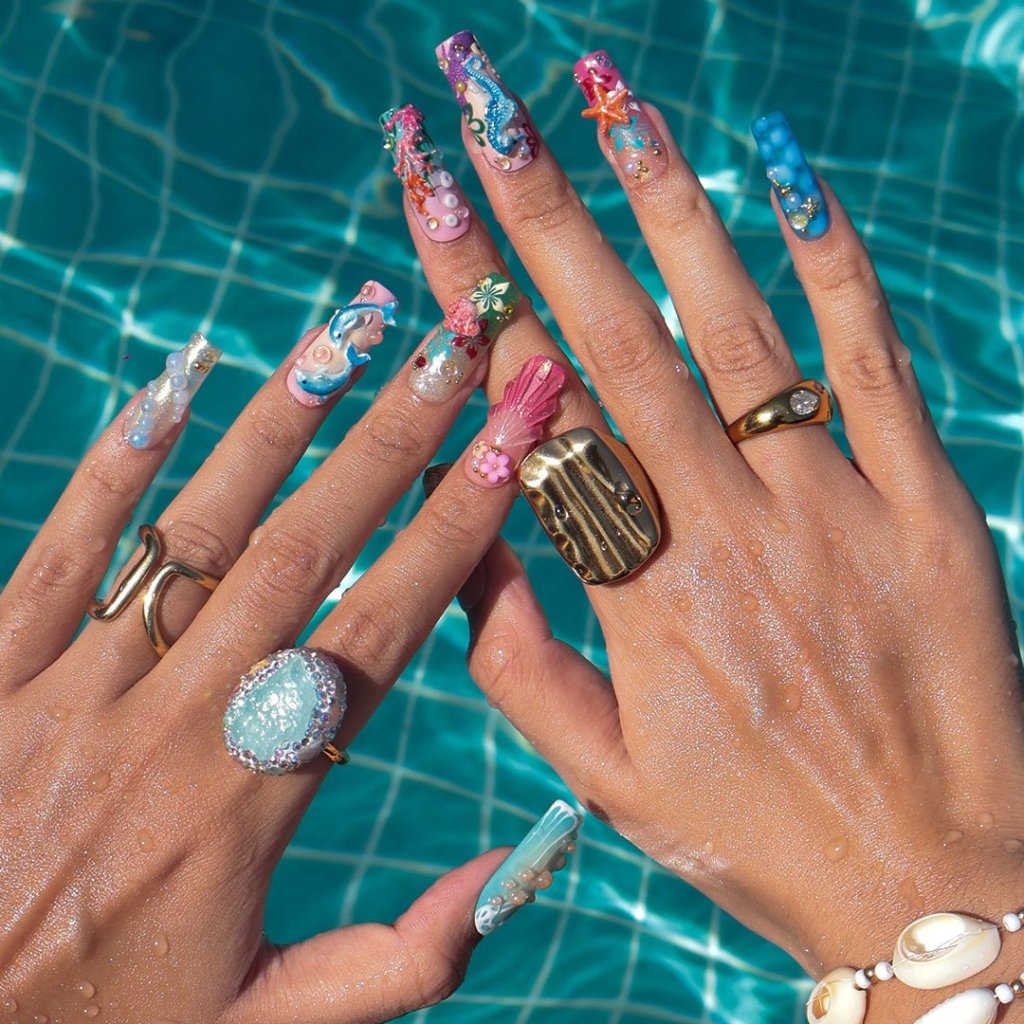 3D ocean press on nails with dolphins, seahorse, starfish, coral reef, and tropical flowers — featuring vibrant colors, glitter seashells, pearl bubbles, and sculpted textures — beach vacation nails, mermaid core press on nails, custom handmade nail art, fake nails, false nails, pressons — perfect for summer getaways, tropical looks, or gifting for ocean lovers.