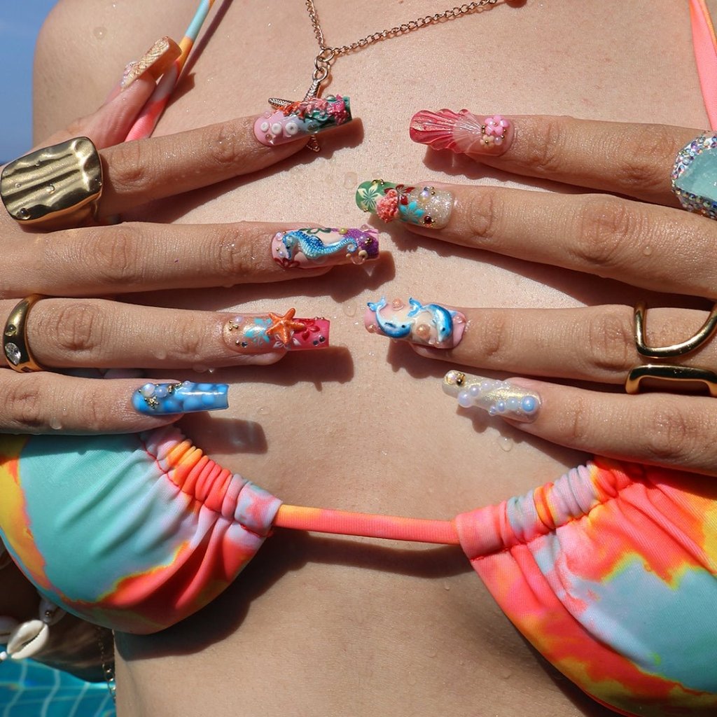 3D ocean press on nails with dolphins, seahorse, starfish, coral reef, and tropical flowers — featuring vibrant colors, glitter seashells, pearl bubbles, and sculpted textures — beach vacation nails, mermaid core press on nails, custom handmade nail art, fake nails, false nails, pressons — perfect for summer getaways, tropical looks, or gifting for ocean lovers.