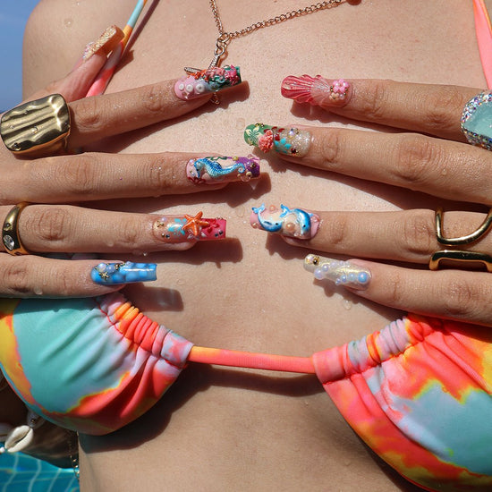 3D ocean press on nails with dolphins, seahorse, starfish, coral reef, and tropical flowers — featuring vibrant colors, glitter seashells, pearl bubbles, and sculpted textures — beach vacation nails, mermaid core press on nails, custom handmade nail art, fake nails, false nails, pressons — perfect for summer getaways, tropical looks, or gifting for ocean lovers.