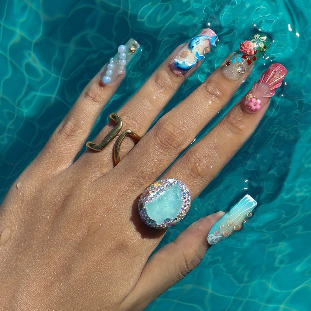 3D ocean press on nails with dolphins, seahorse, starfish, coral reef, and tropical flowers — featuring vibrant colors, glitter seashells, pearl bubbles, and sculpted textures — beach vacation nails, mermaid core press on nails, custom handmade nail art, fake nails, false nails, pressons — perfect for summer getaways, tropical looks, or gifting for ocean lovers.