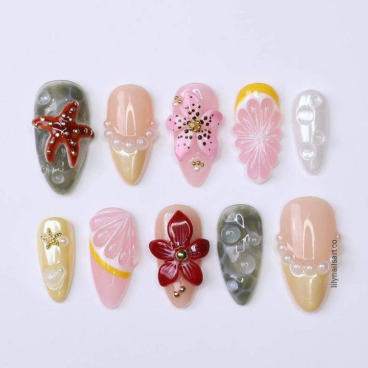 3D summer nails with sculpted red flowers, starfish, seashells, pearls, and soft ocean textures in nude, blush, and sea-glass green tones — luxury handmade press on nail , reusable false nails — perfect for romantic summer looks, beach weddings, or resort vacations.

