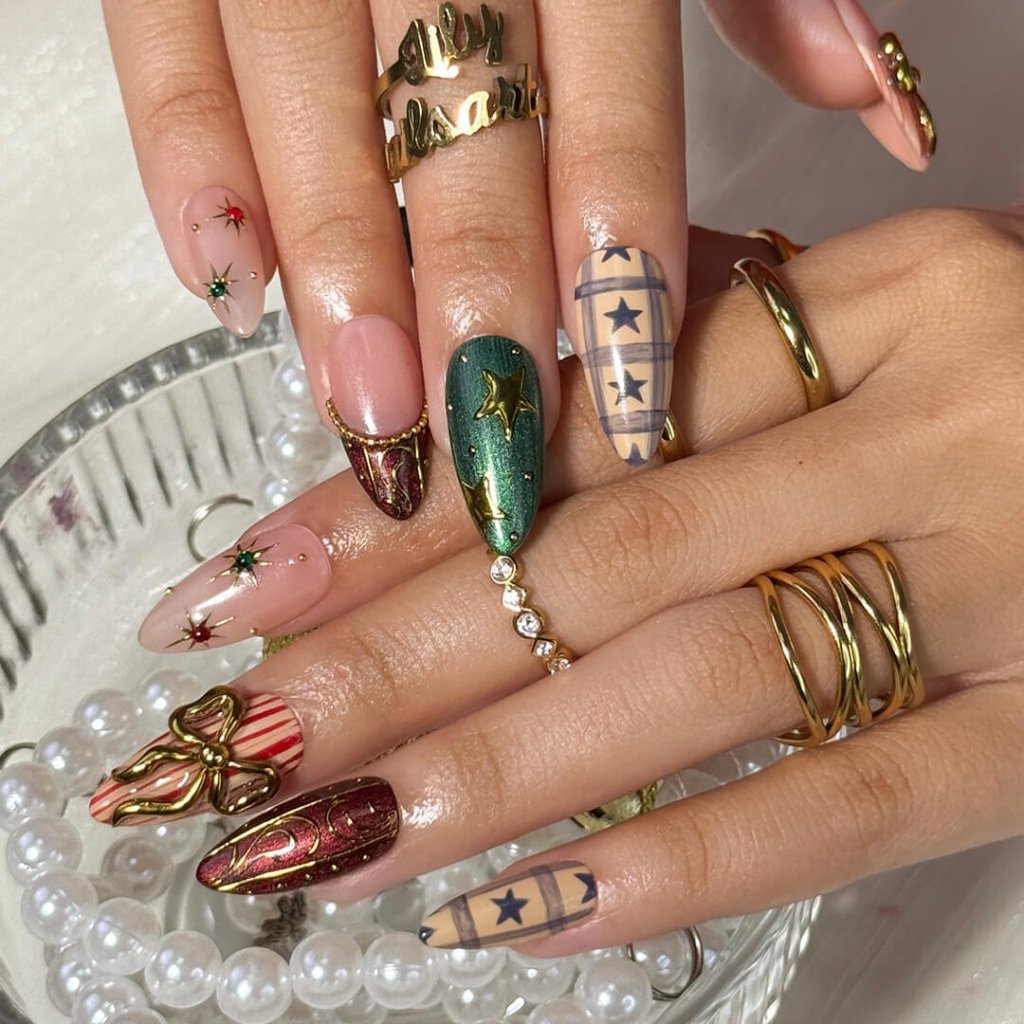 3D red and green custom Christmas press on nails with gold star accents, metallic bows, candy cane stripes, and plaid designs — holiday fake nails, handmade false nails, luxury pressons — perfect for winter parties or as a festive gift idea