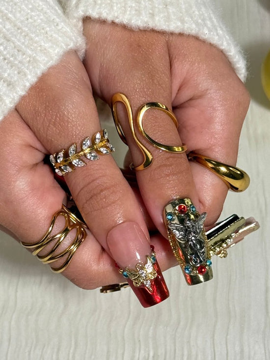 Renaissance-inspired red and gold press on nails with 3D baroque charms, gothic gemstone accents, and ornate metallic detailing — handmade luxury press ons, reusable nail art, false nails, fake nails — perfect for holiday parties, Christmas glam, or editorial photoshoots.