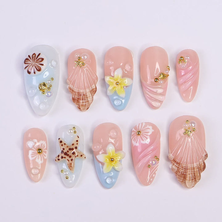 pastel summer nails  with seashells, daisies, starfish, and pearls — handmade luxury nail art in pastel pink and soft blue tones, reusable and custom-fit — perfect for beach getaways, tropical nails art for holiday, vacation, beach day